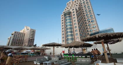 sea sun and fun on the mediterranean beach , restaurants and bars near by