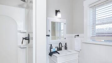 Hair dryer, towels, soap, toilet paper