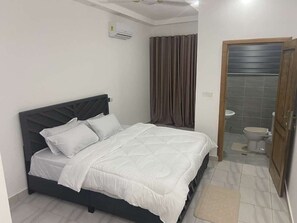 2 chambres, fer et planche à repasser, Wi-Fi, draps fournis