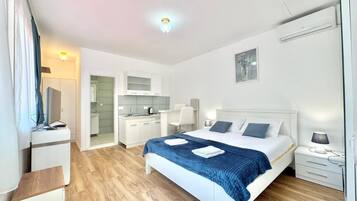 Deluxe Studio | Premium bedding, desk, soundproofing, iron/ironing board