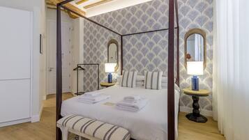 Een strijkplank/strijkijzer, gratis wifi, beddengoed