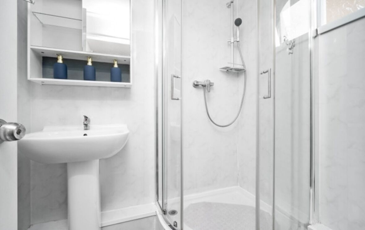 Shower, towels, soap, shampoo