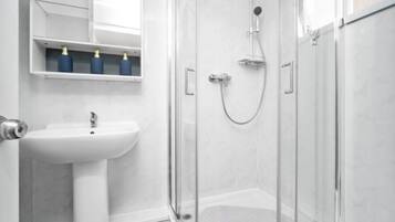 Shower, towels, soap, shampoo