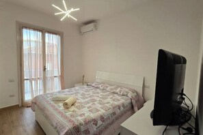 2 chambres, fer et planche à repasser, Wi-Fi, draps fournis