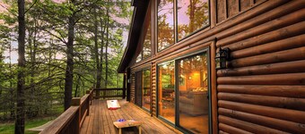 Logged & Loaded Cabin! 9Min to WISP! Hot tub, fire pit! Pets! EV charger!
