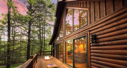 Logged & Loaded Cabin! 9Min to WISP! Hot tub, fire pit! Pets! EV charger!
