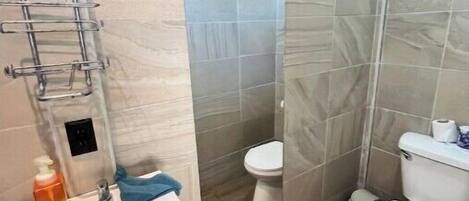 Shower, towels, soap, shampoo