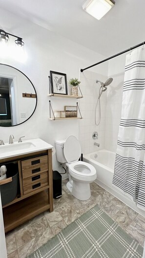 Hair dryer, towels, soap, shampoo