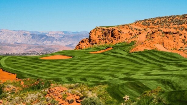 A golf course with sand bunkers and a mountainous backdrop. - Two Heated Pools/Spas, BBQ, Golf Course (Washington)