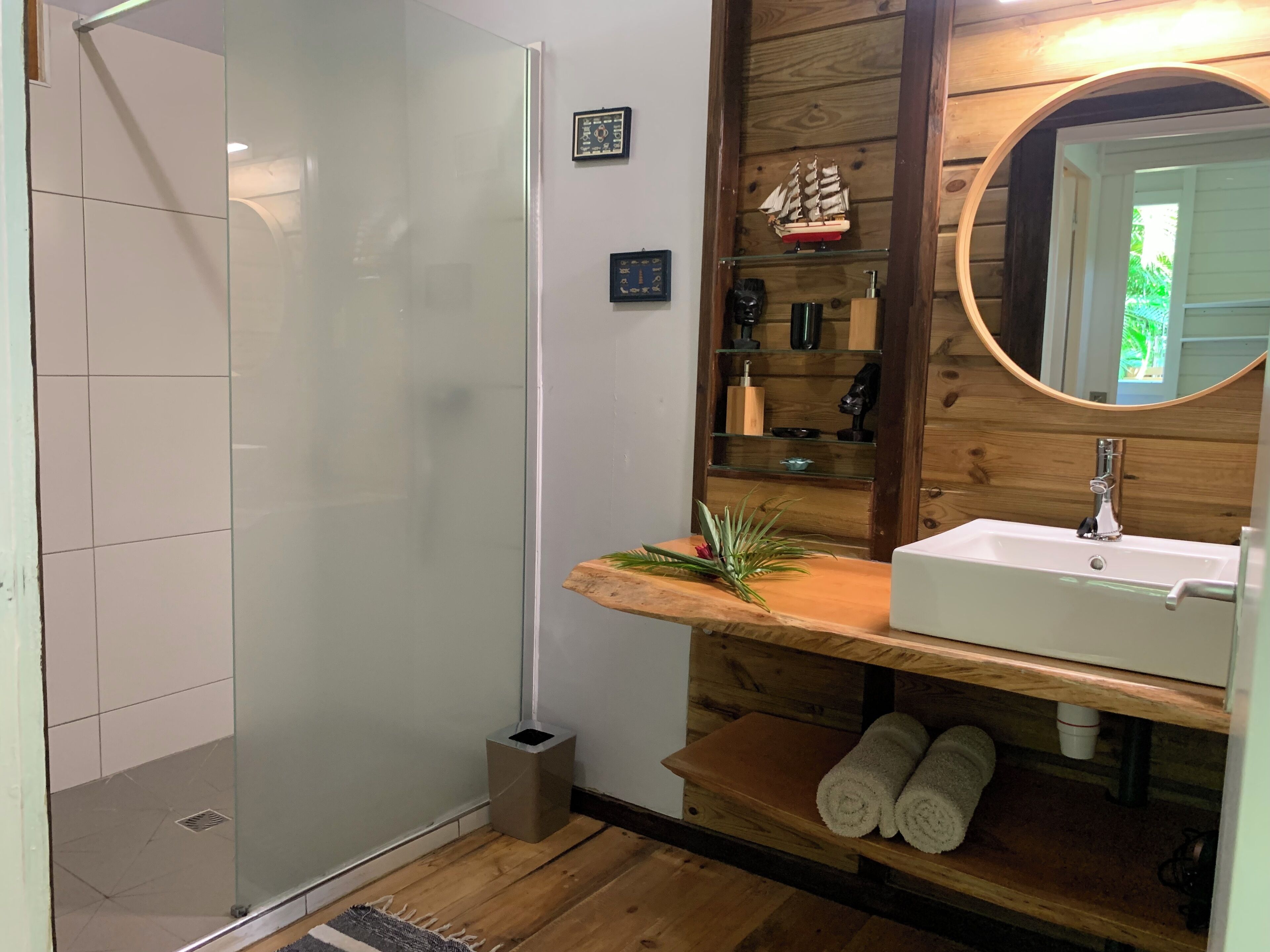 Shower, hair dryer, towels, toilet paper