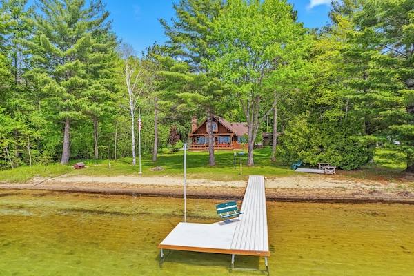 view from the lake looking back at the house
