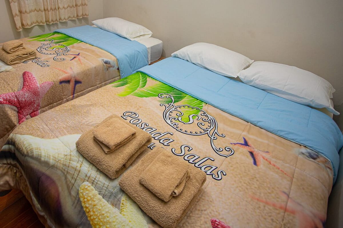 Basic Triple Room, 1 Bedroom, Private Bathroom, Courtyard View | Free WiFi
