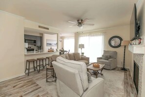 Condo, Multiple Beds, Patio (1100 The Cape #701) | Living area | Fireplace