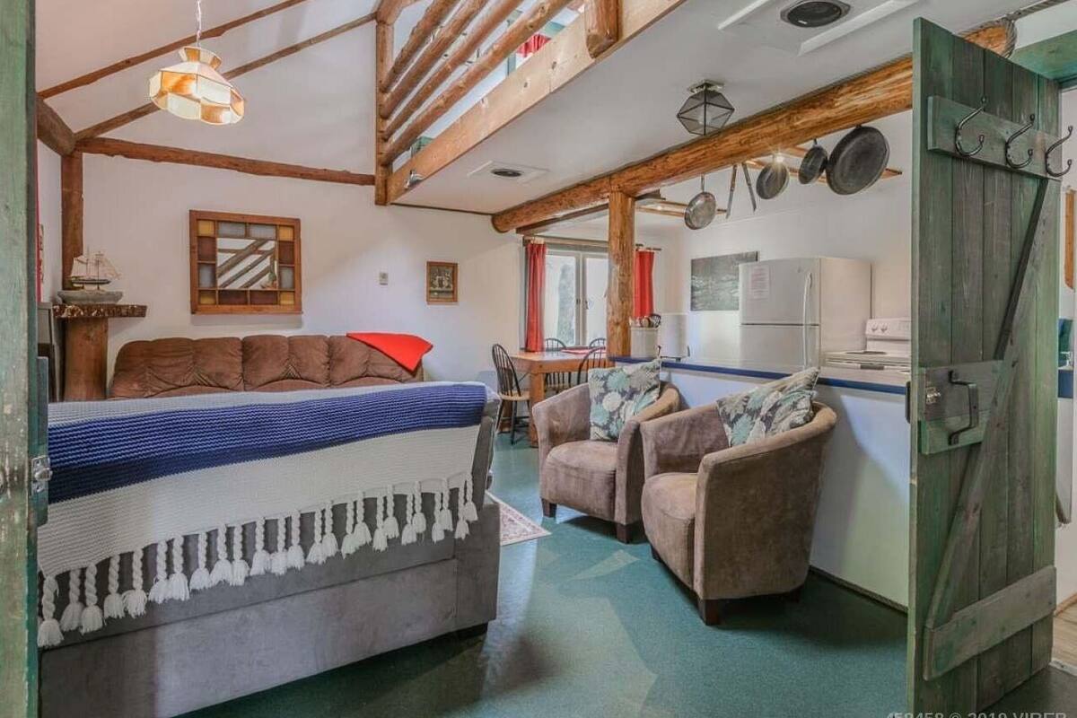 Comfort Cabin, Balcony | Living area | 42-inch flat-screen TV with satellite channels