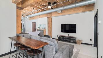 Smart TV, fireplace, books, offices