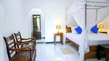 Deluxe Double Room, Garden View | In-room safe, desk, laptop workspace, soundproofing