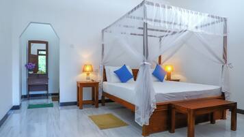 Deluxe Double Room, Garden View | In-room safe, desk, laptop workspace, soundproofing