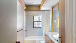 Shower, jetted tub, hair dryer, towels