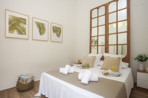 1 habitación, tabla de planchar con plancha, cuna de viaje y wifi 