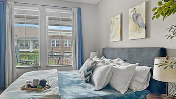 1 bedroom, desk, iron/ironing board, travel crib