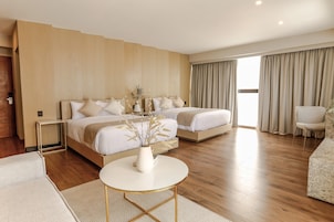 Ropa de cama de alta calidad y minibar