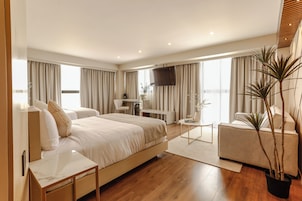 Ropa de cama de alta calidad y minibar