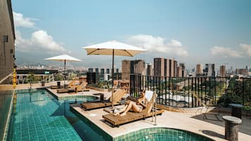 Outdoor pool, open 9:00 AM to 8:00 PM, pool umbrellas, sun loungers