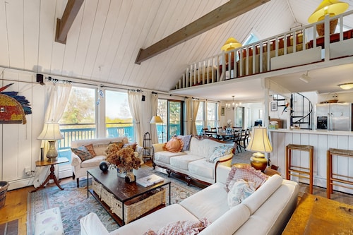 Private island house with close beach access and water view from deck