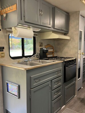 Fridge, microwave, oven, stovetop - The L & R Bunkhouse Camping At it's Best!    
 (Stokesdale)