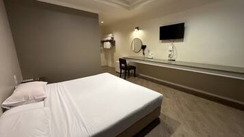 Standard Room, City View | Desk, blackout drapes, free WiFi