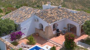 A two-story house with a tiled roof, a swimming pool, and a patio area. - Los Lobitos - Benitachell, Costa Blanca (Benitachell)