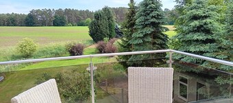 Casa de vacaciones 'Zur Schmiede' con terraza privada, jardín privado y balcón