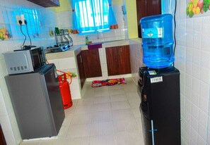 Classic Apartment, City View | Private kitchen | Fridge, microwave, cookware/dishes/utensils