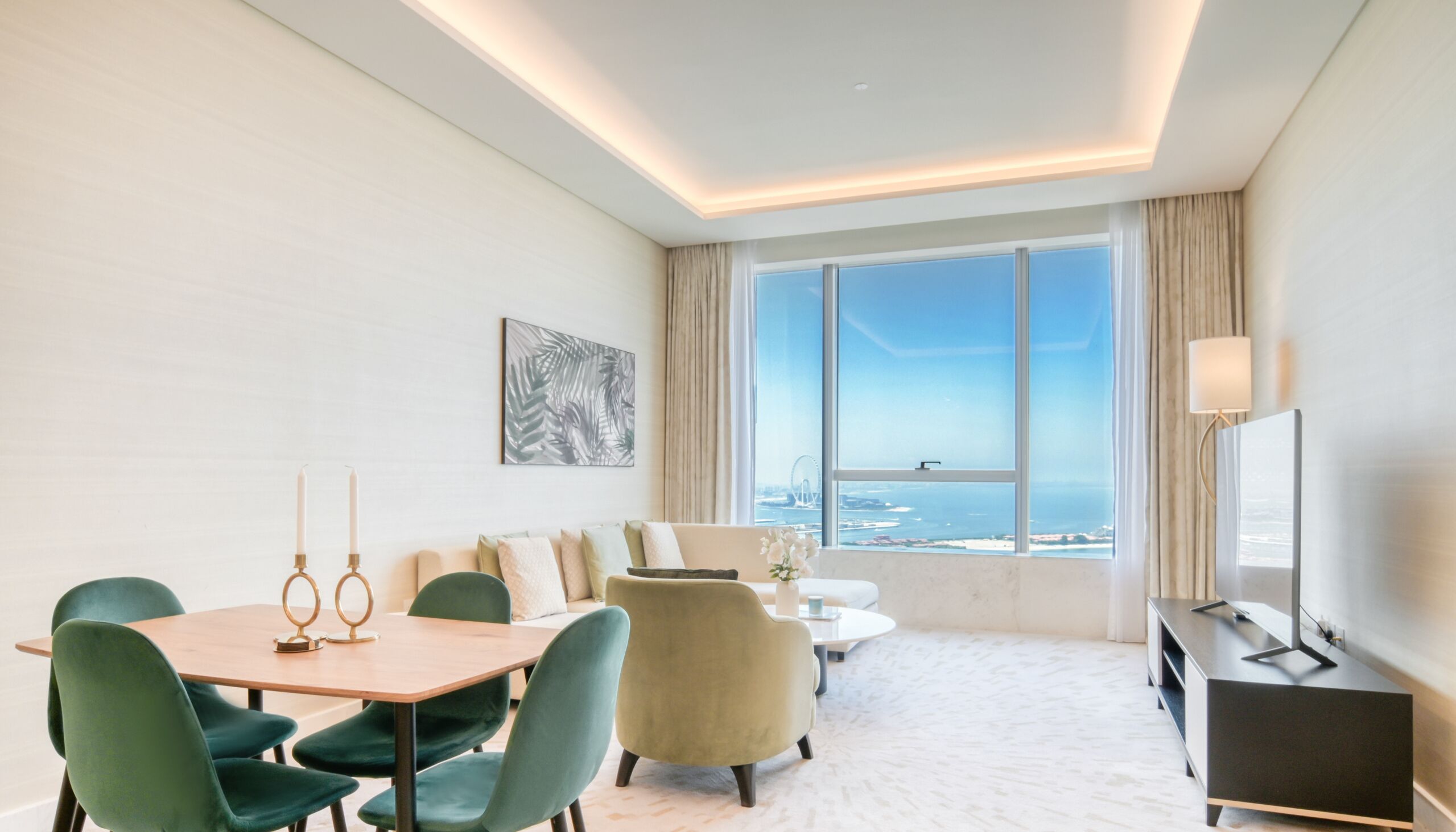 Deluxe Apartment, Sea View | Living area | 55-inch Smart TV with cable channels