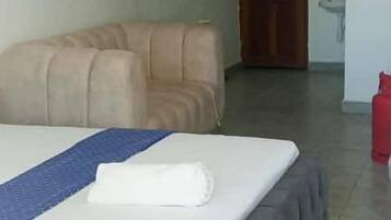 Comfort Studio, City View | Living area | 24-inch Smart TV with digital channels