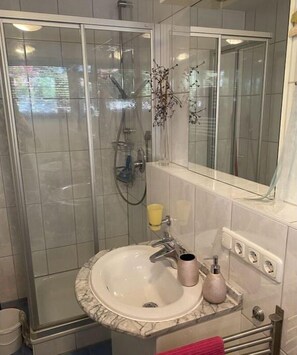 Shower, hair dryer