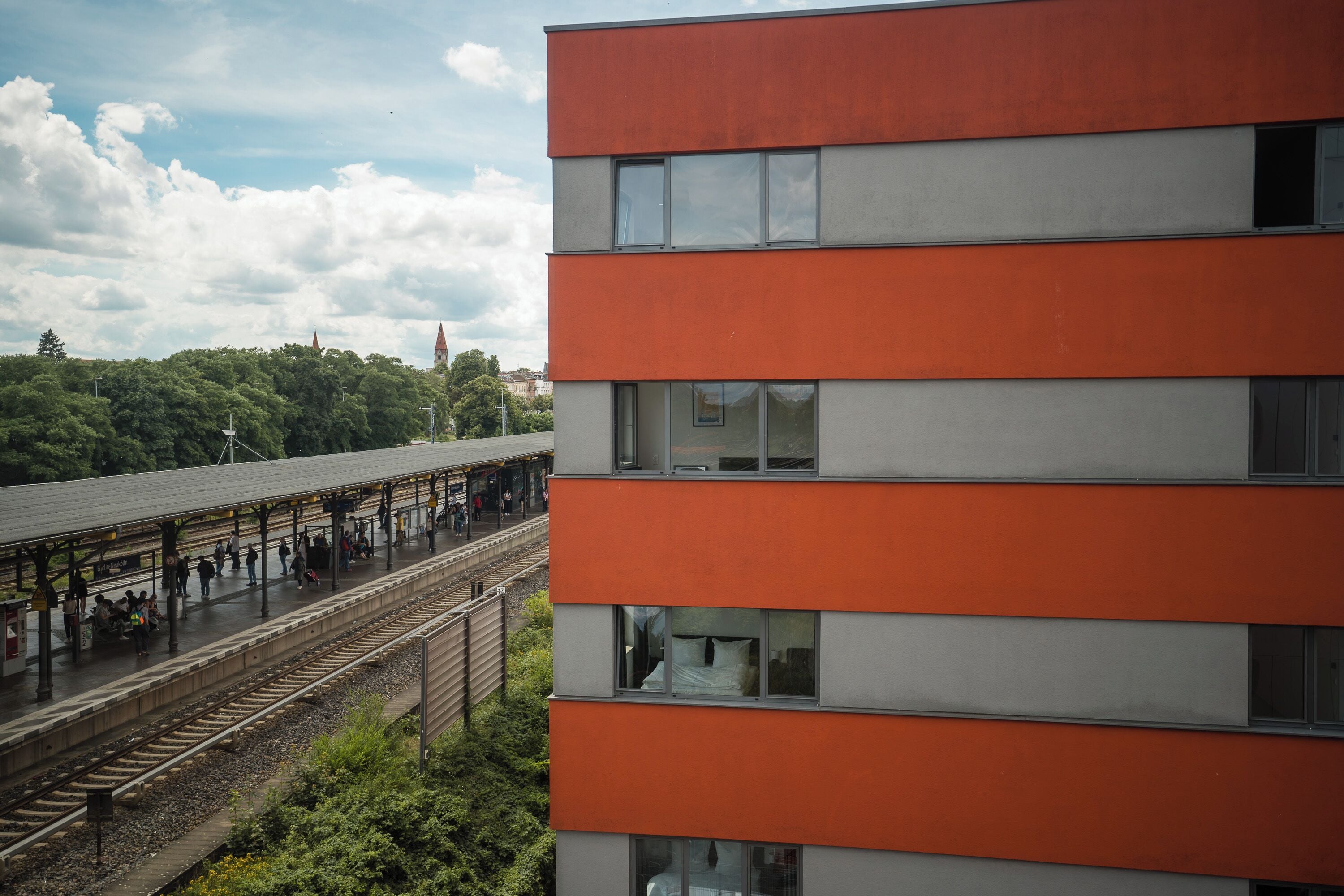 A modern building with multiple windows and a flat roof.