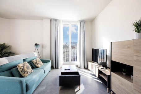 Premium Penthouse | Living area | 32-inch flat-screen TV with digital channels