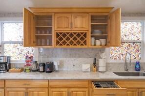 Fridge, microwave, dishwasher, coffee/tea maker