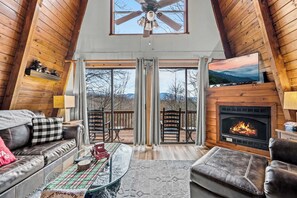 TV, fireplace, books, stereo - Cozy & Comfortable Cabin I Great View I Hot Tub (Sevierville)