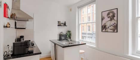 Fridge, microwave, dishwasher, coffee/tea maker