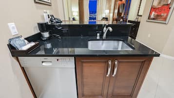 Coffee/tea maker, fridge, microwave, oven