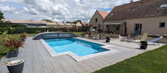 Family Retreat with Heated Pool, Garden, and Kids' Play Area