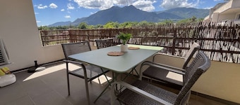 Seaside Haven: Air-Conditioned 1BR with Terrace, Near Beach and Shops
