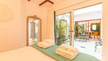 Luxury Apartment, Patio | 1 bedroom, in-room safe, individually decorated, individually furnished