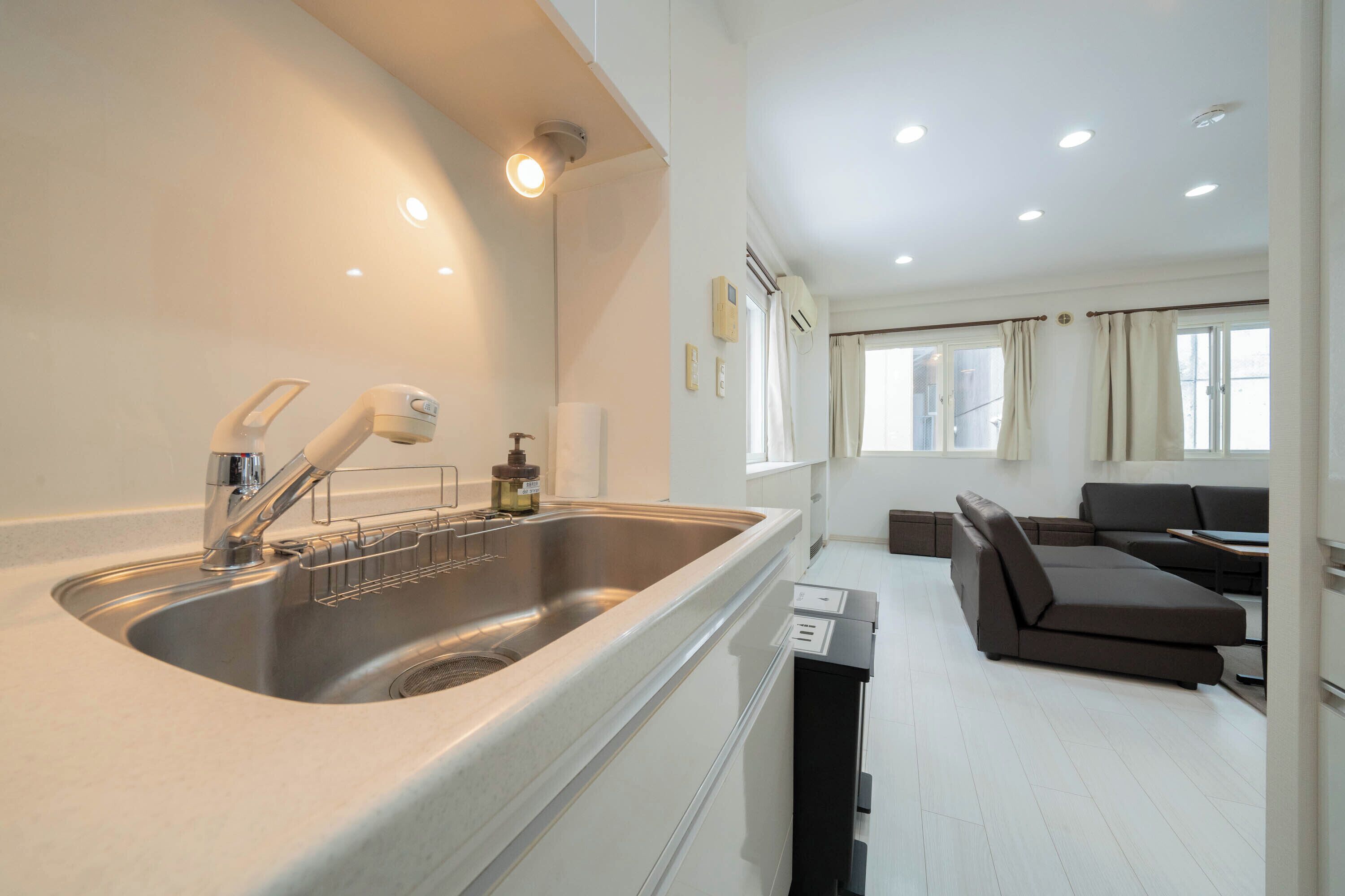 Family Room | Private kitchen | Full-sized fridge, microwave, stovetop, rice cooker