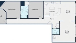 A floor plan with three bedrooms, a kitchen, dining room, living room, foyer, and a laundry area. - Loft above the Villager Pub with Round Lake marina sunsets — walk Bridge St + East Park. (Charlevoix)
