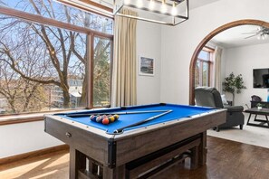 Games room - Loft above the Villager Pub with Round Lake marina sunsets — walk Bridge St + East Park. (Charlevoix)