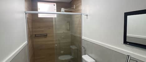Shower, towels, soap, toilet paper