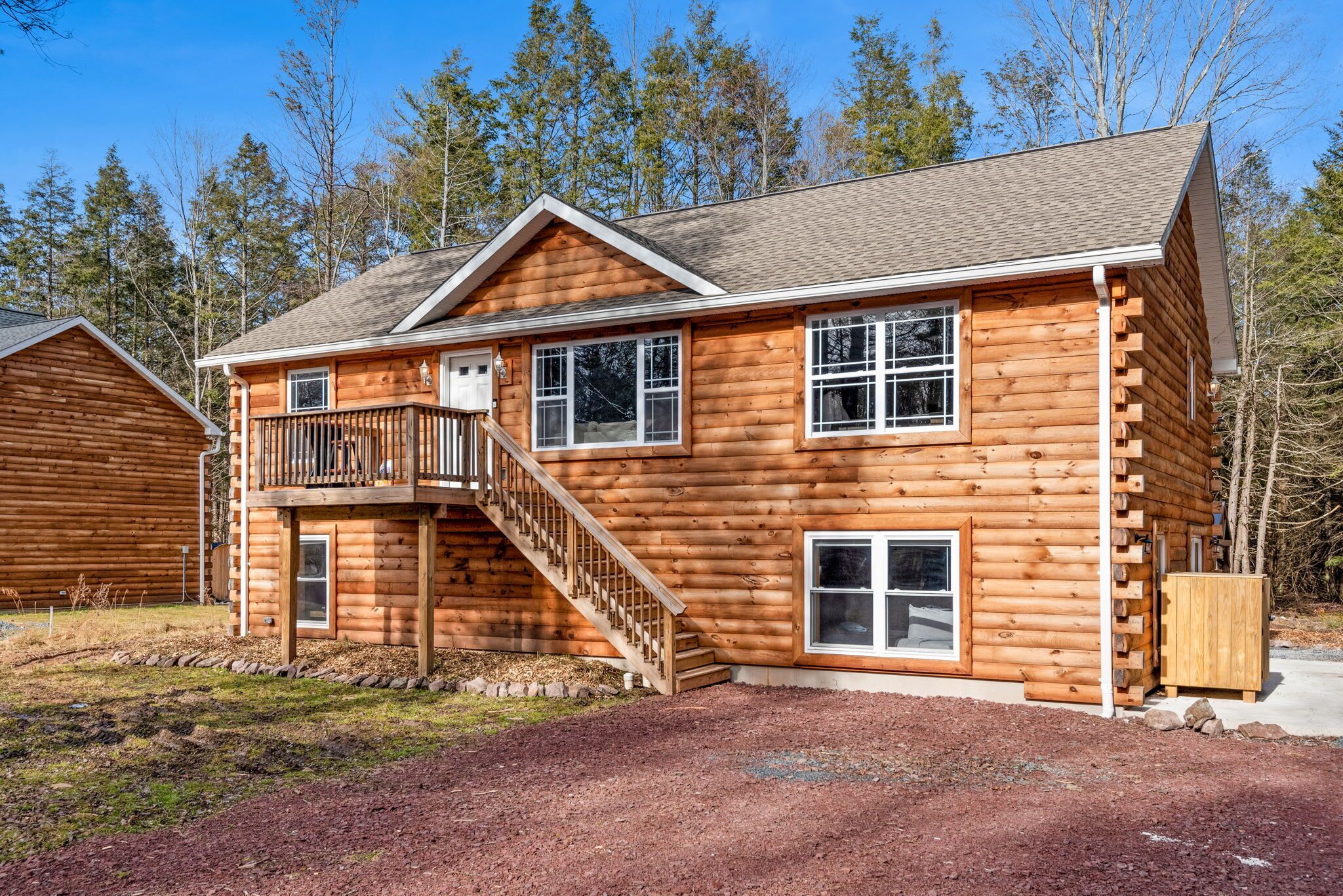 Rustic Cabin-Style Exterior
This inviting log-sided home offers mountain charm with modern comfort set against a peaceful wooded backdrop, it’s the perfect escape from the everyday.